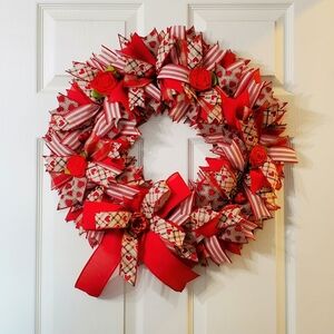 Vibrant Red Holiday Wreath with Ribbon Accents